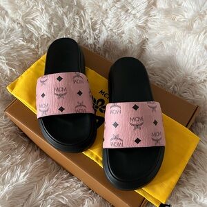 MCM Pink and Black Logo Slides